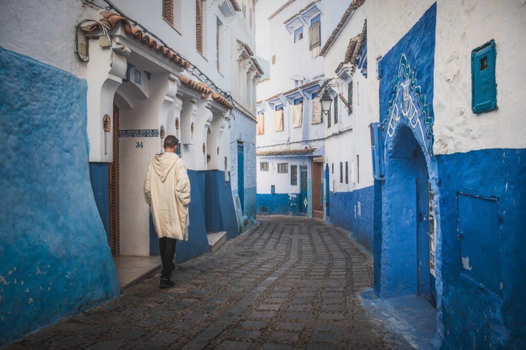 Man walking in the medina in Chefchaouen Morocco