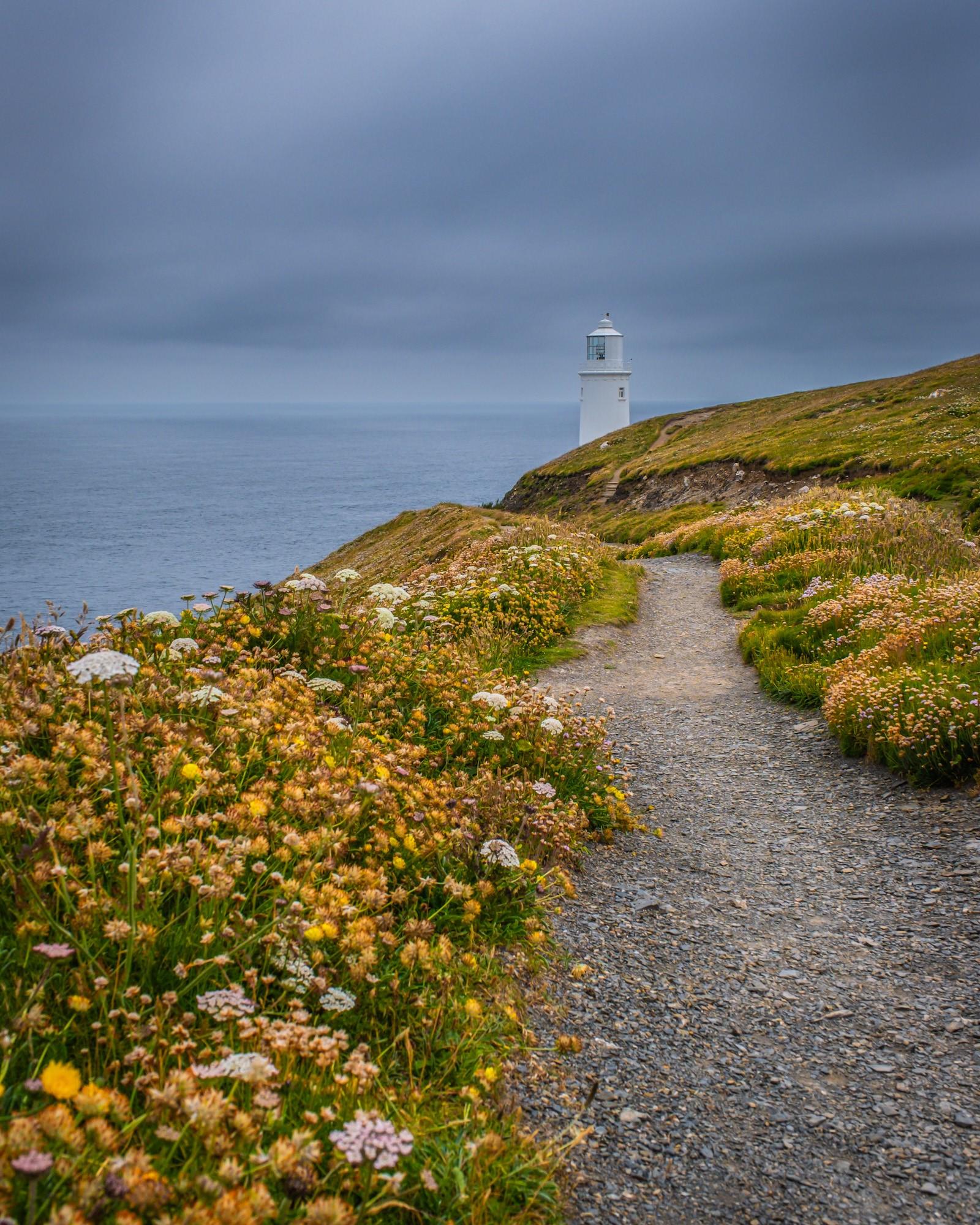 Coastal path and lighthouse in Cornwall England