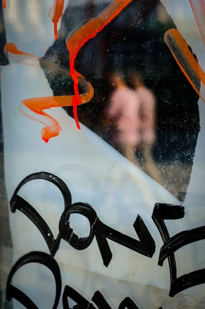 Reflections of men in the old town of Bucharest Romania