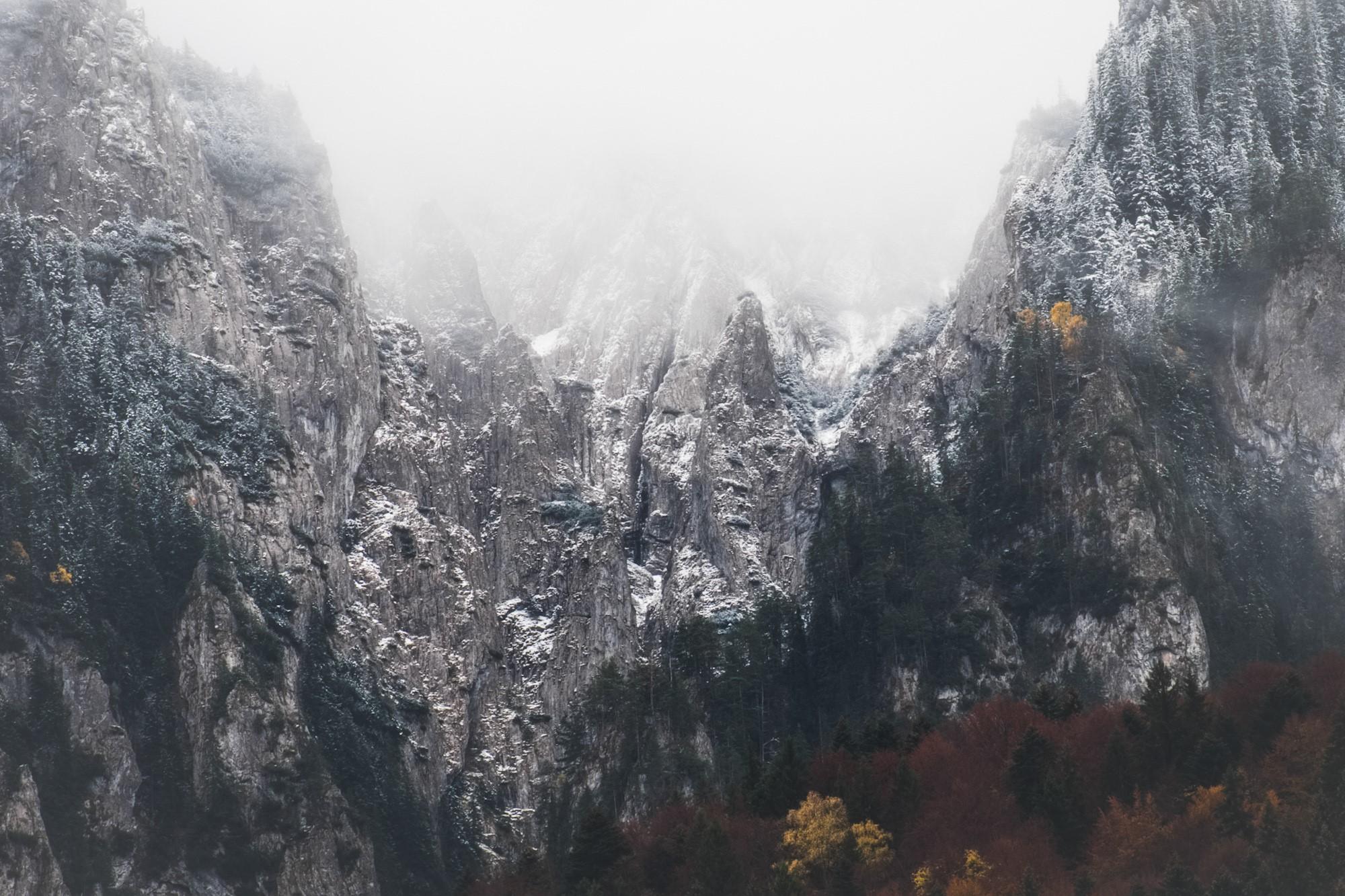 Foggy view of the Piatra Craiului mountains seen from Plaiul Foii in Romania