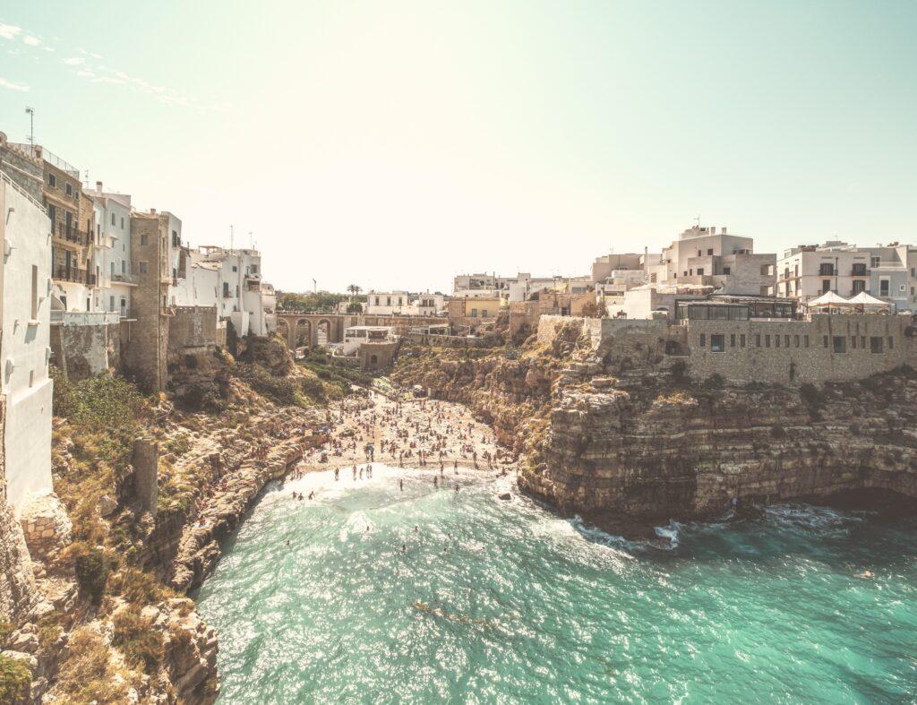 Old street with white buildings in Puglia Italy