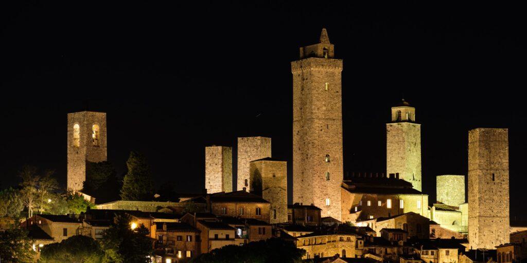 Medieval towers of San Gimignano photographed at night in Tuscany Italy