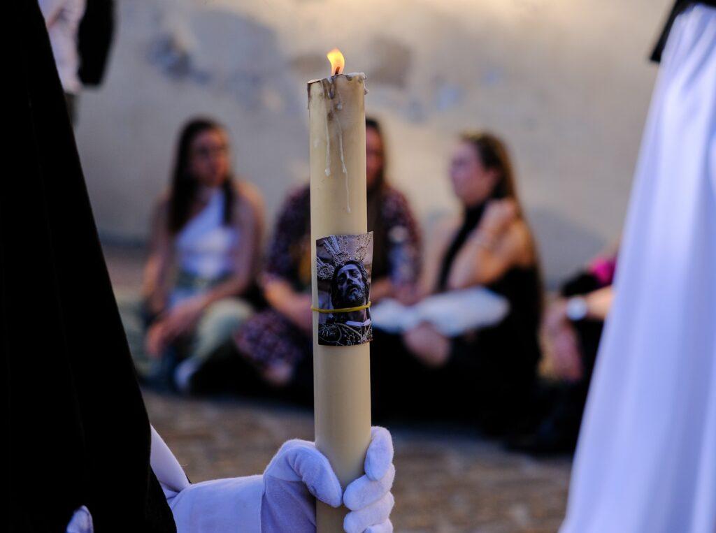 Candle during the Semana Santa procession in Cordoba Spain