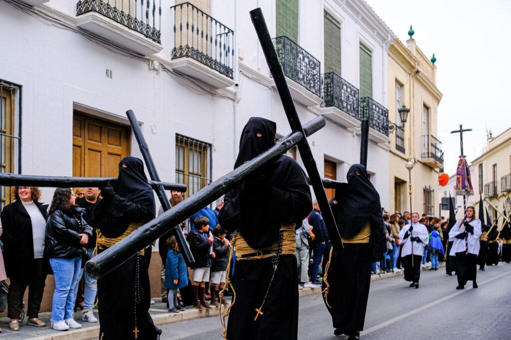 Semana Santa procession moving through the streets of Ronda Spain