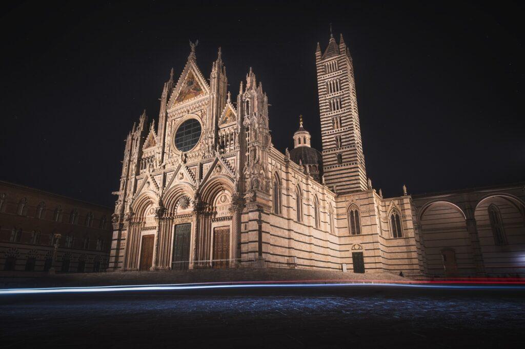 Siena Cathedral illuminated at night in Tuscany