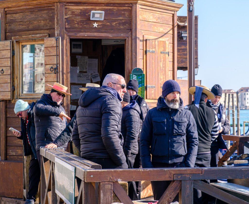 Gondoliers in Venice Italy on a break