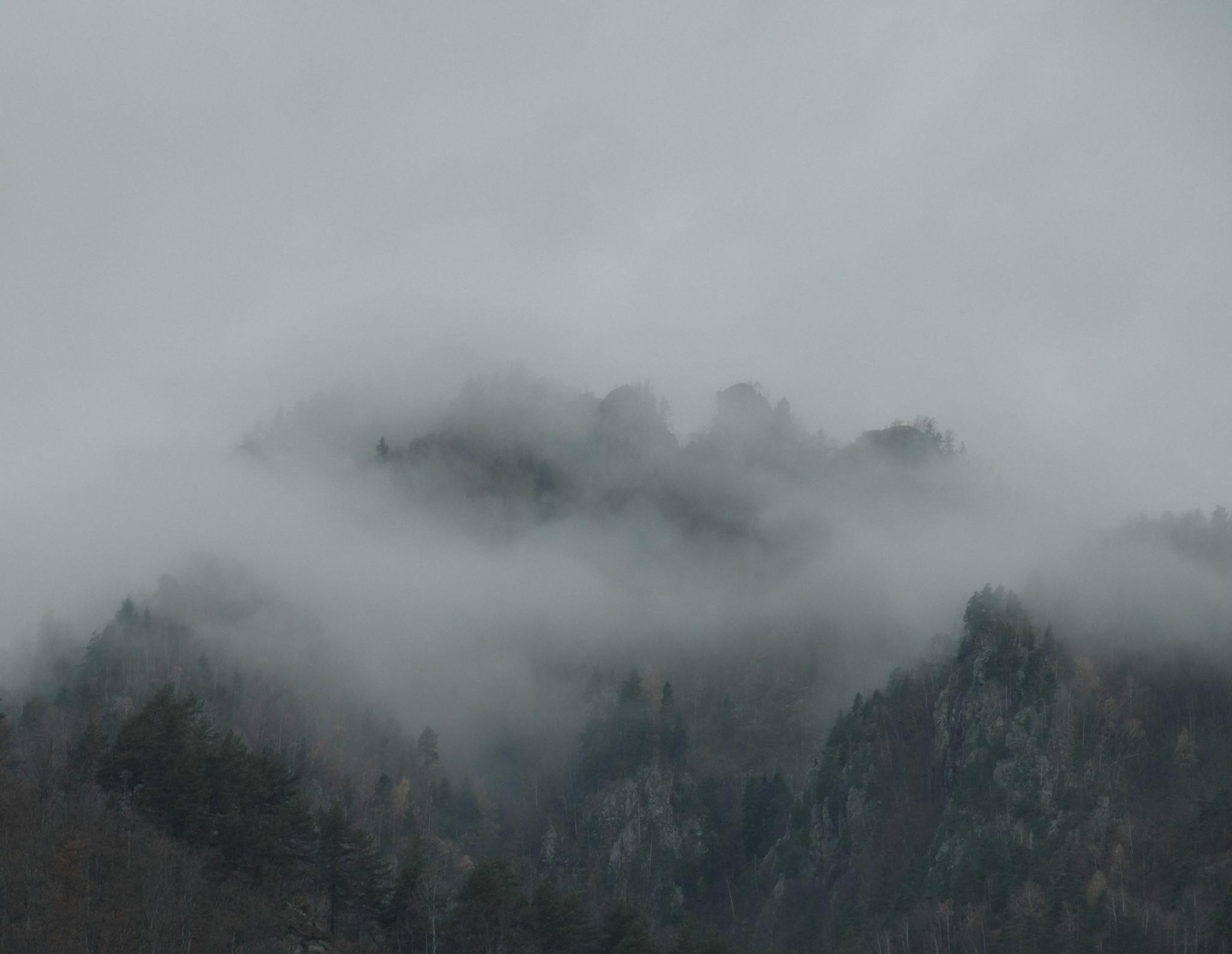 Misty peaks on the road to Transalpina Romania