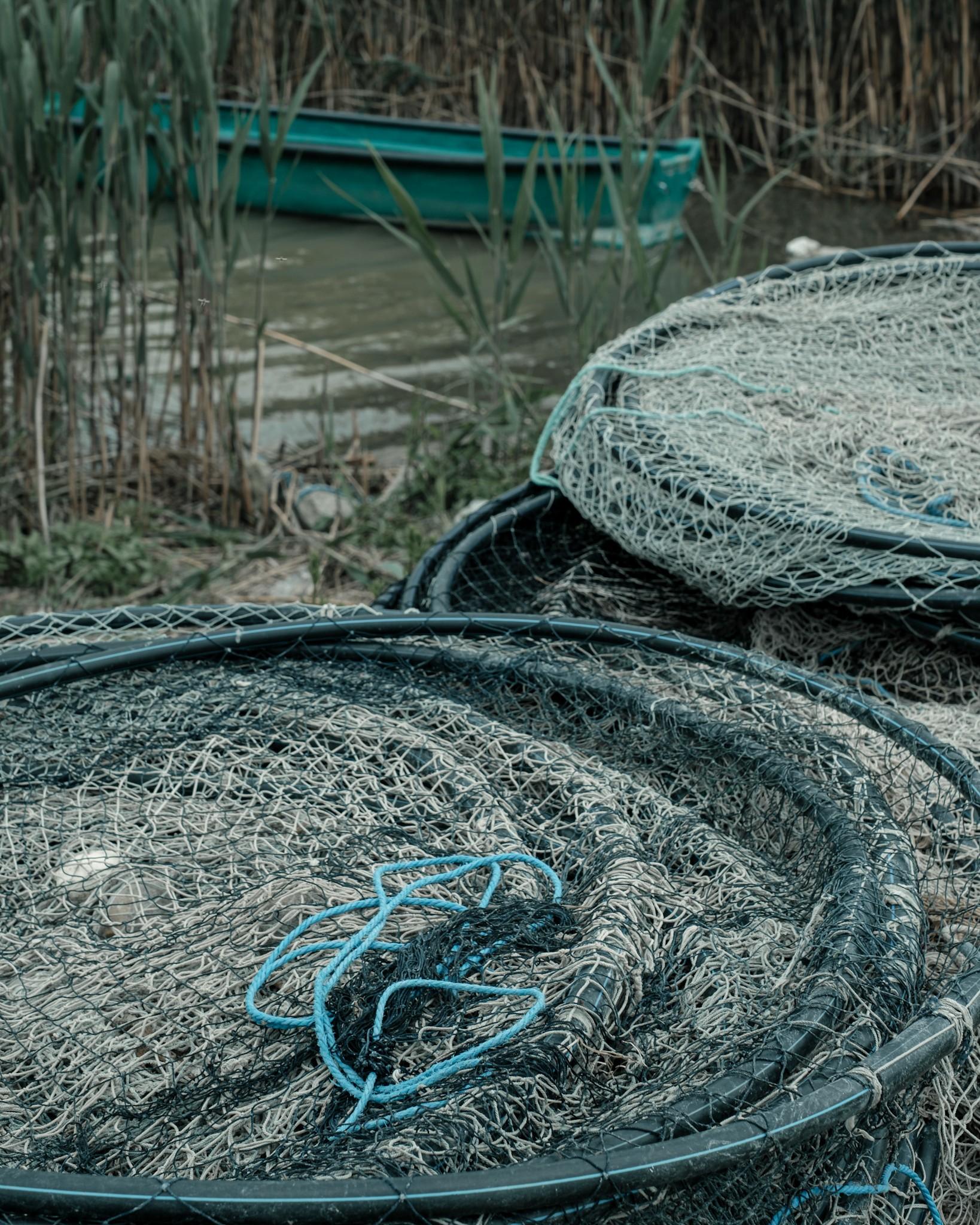 Fishing nets and an old boat in Sarichioi Romania