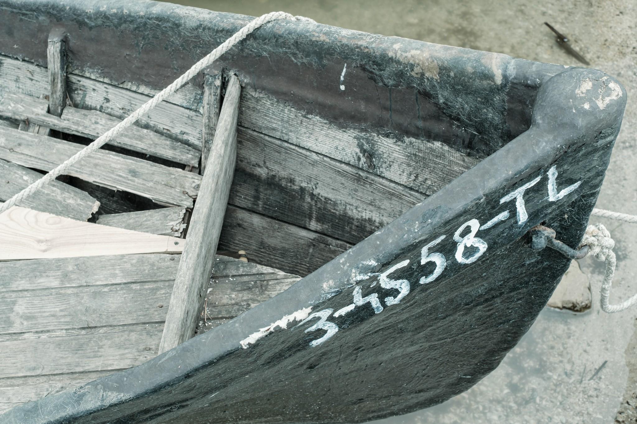 White numbers on an old boat in Sarichioi Romania